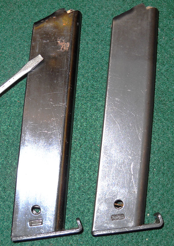 detail comparing damaged and undamaged L-35 or m/40 magazines